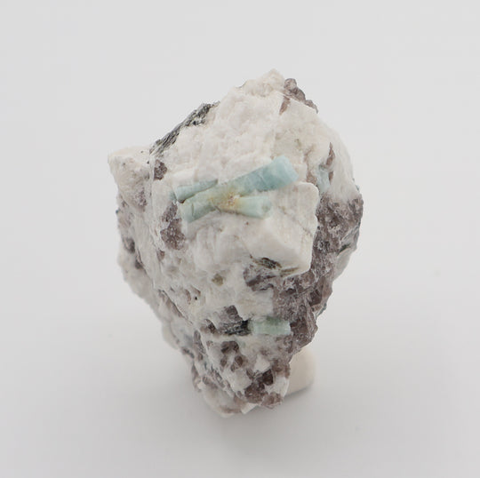 Aquamarine and Bi-Colour Beryl with Mica on Smoky Quartz and Feldspar