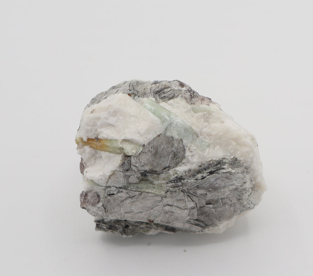 Aquamarine and Bi-Colour Beryl with Mica on Smoky Quartz and Feldspar