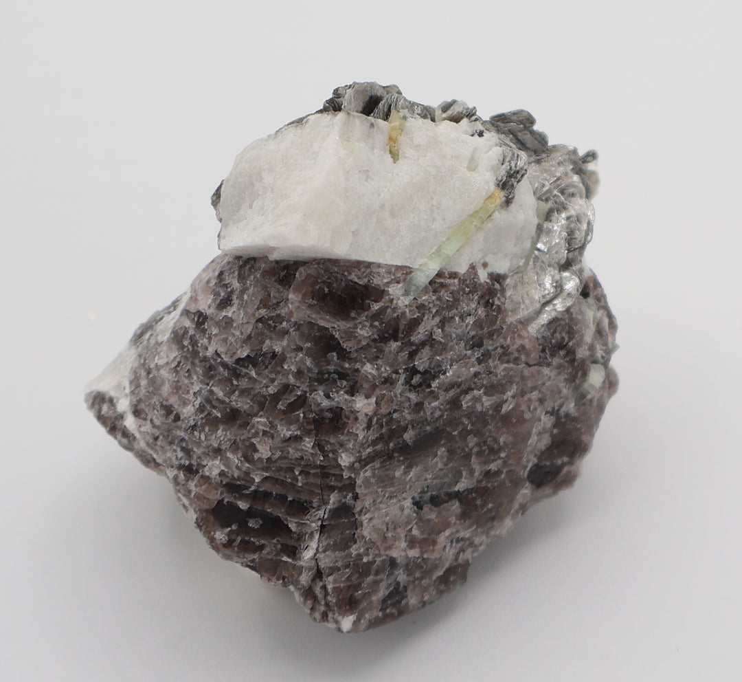 Aquamarine and Heliodor with Mica, Apatite, on Smoky Quartz and Feldspar