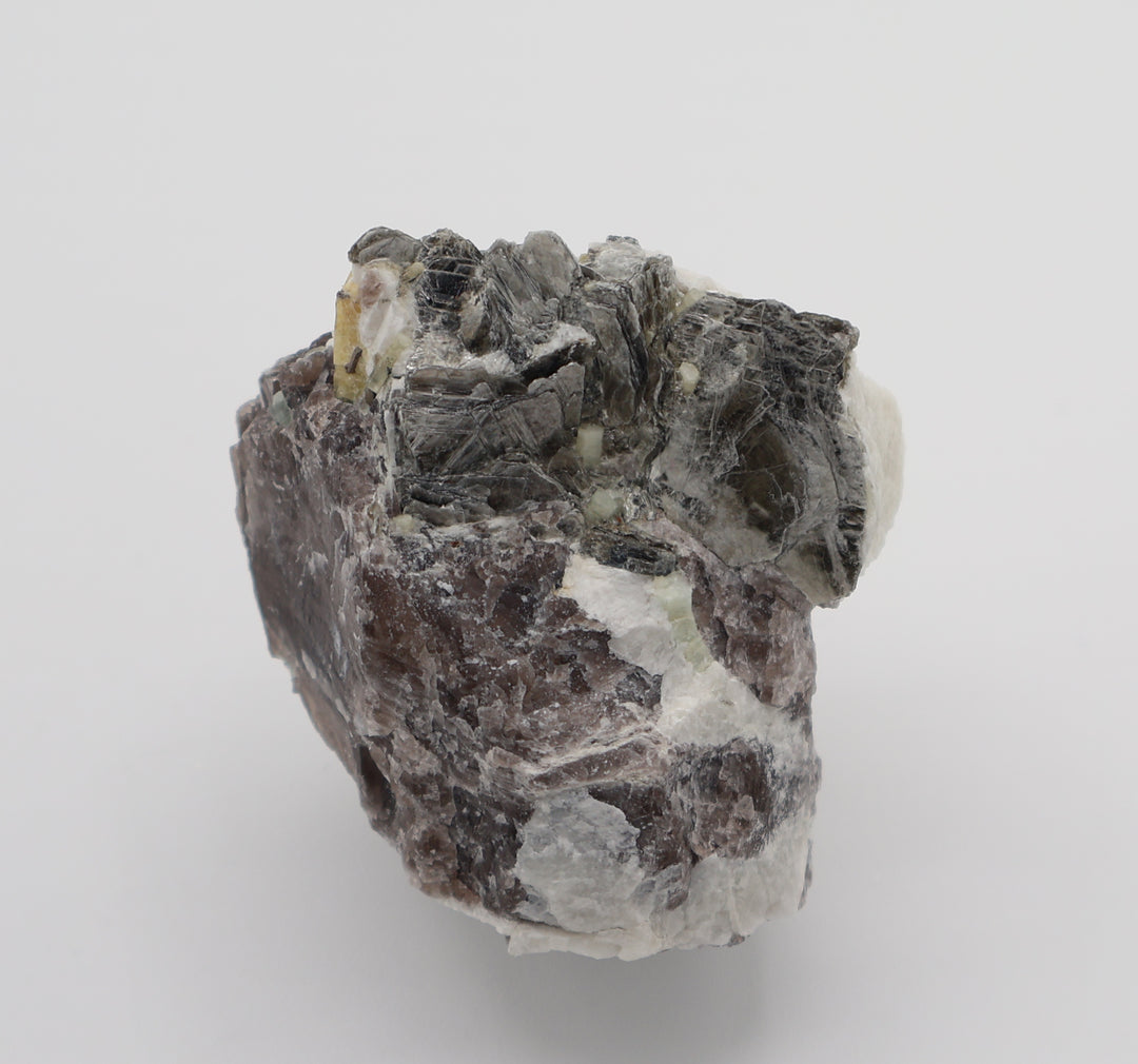 Aquamarine and Heliodor with Mica, Apatite, on Smoky Quartz and Feldspar