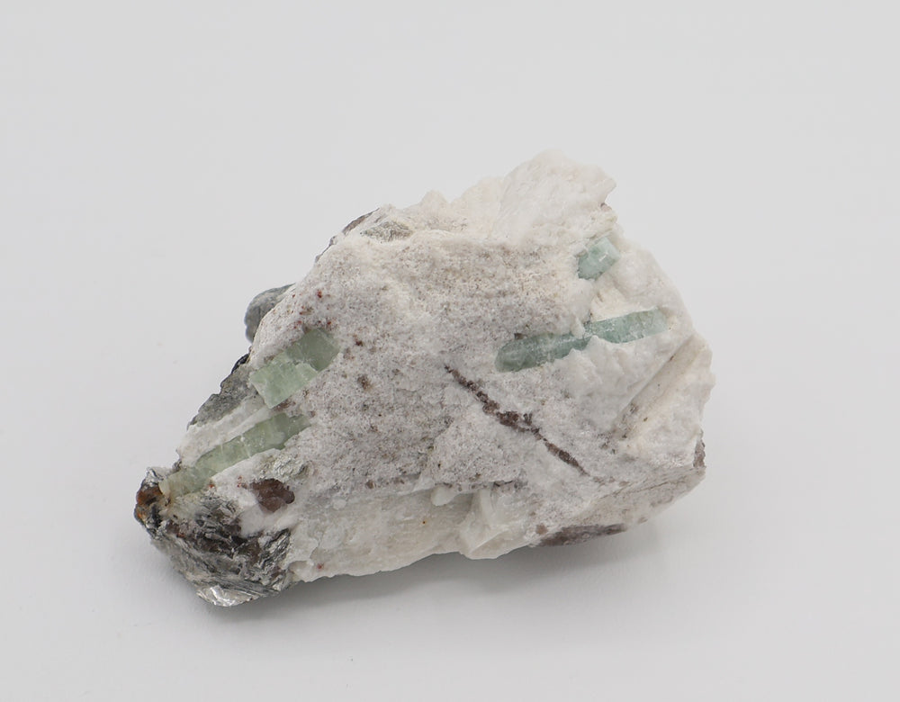 Aquamarine cluster with Mica and Smoky Quartz on Feldspar