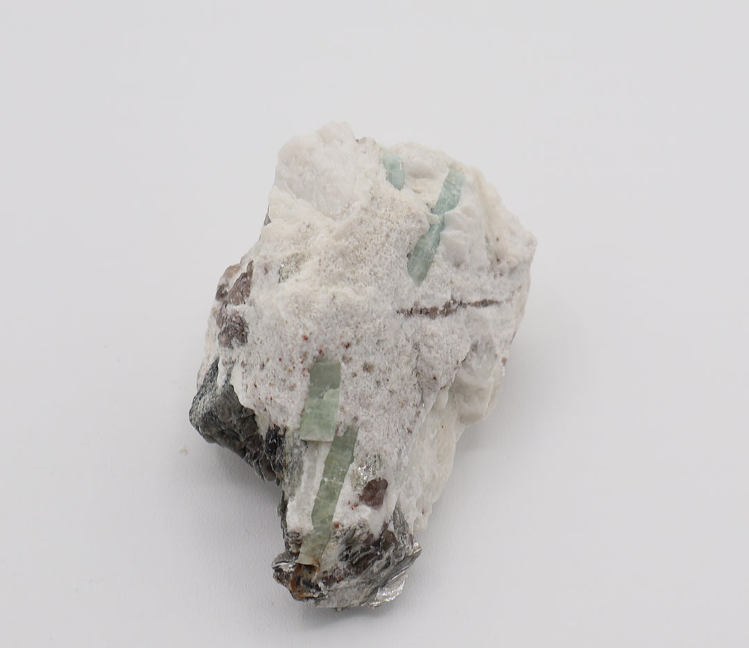 Aquamarine cluster with Mica and Smoky Quartz on Feldspar