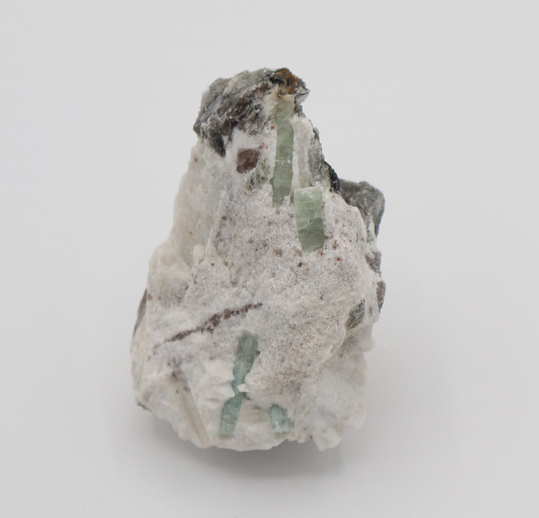 Aquamarine cluster with Mica and Smoky Quartz on Feldspar