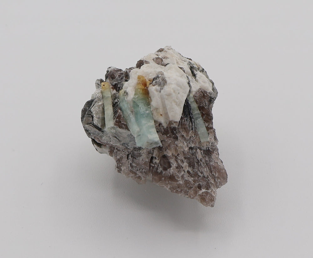 Heliodor Capped Aquamarine Cluster with Mica on Smoky Quartz and Feldspar