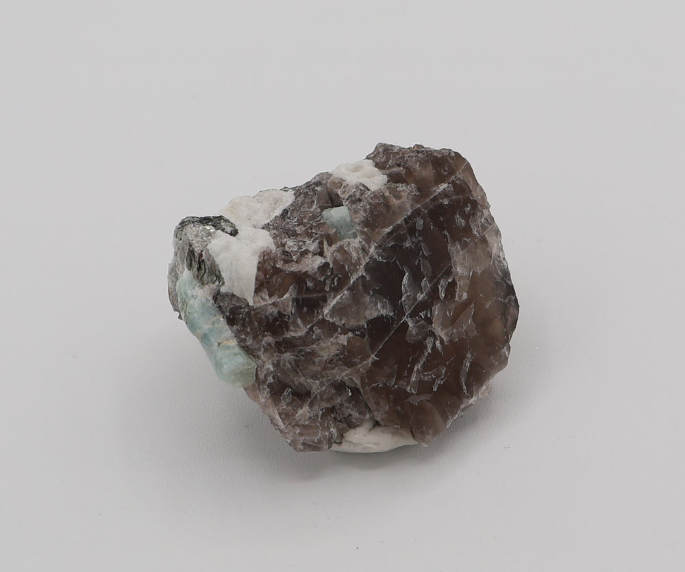 Aquamarine with Mica on Smoky Quartz and Feldspar