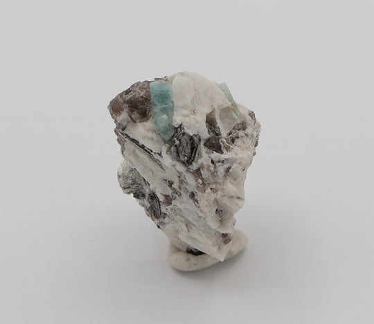 Aquamarine and Bi-Colour Beryl with Mica on Smoky Quartz and Feldspar
