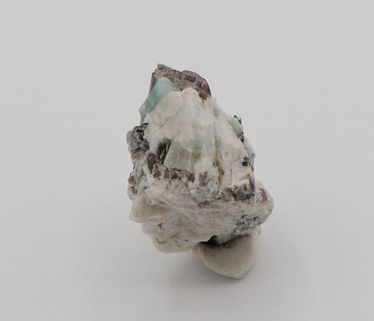 Aquamarine and Bi-Colour Beryl with Mica on Smoky Quartz and Feldspar
