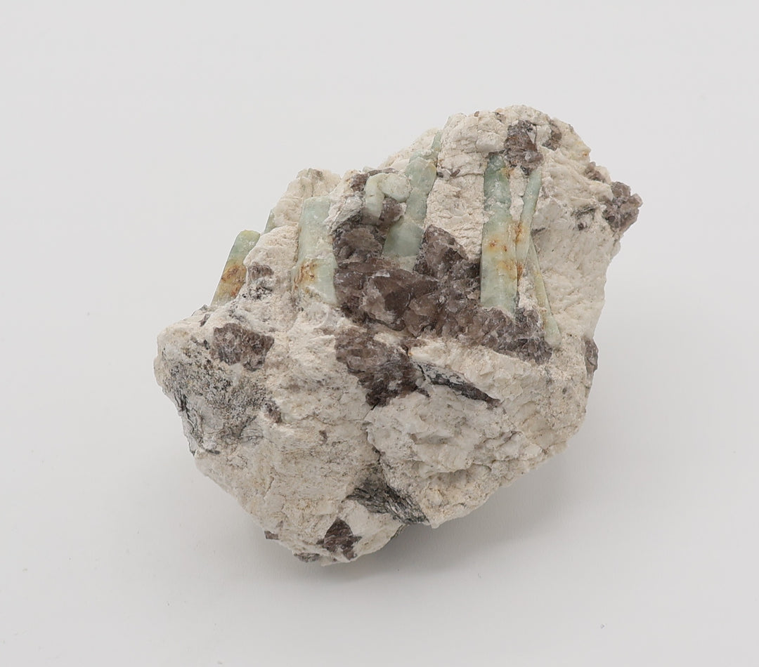Beryl Cluster with Mica on Smoky Quartz and Feldspar