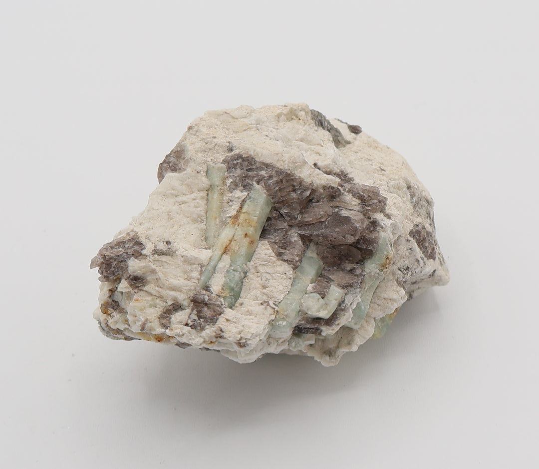 Beryl Cluster with Mica on Smoky Quartz and Feldspar
