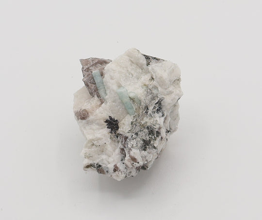 Aquamarine with Hematite, Mica, on Smoky Quartz and Feldspar