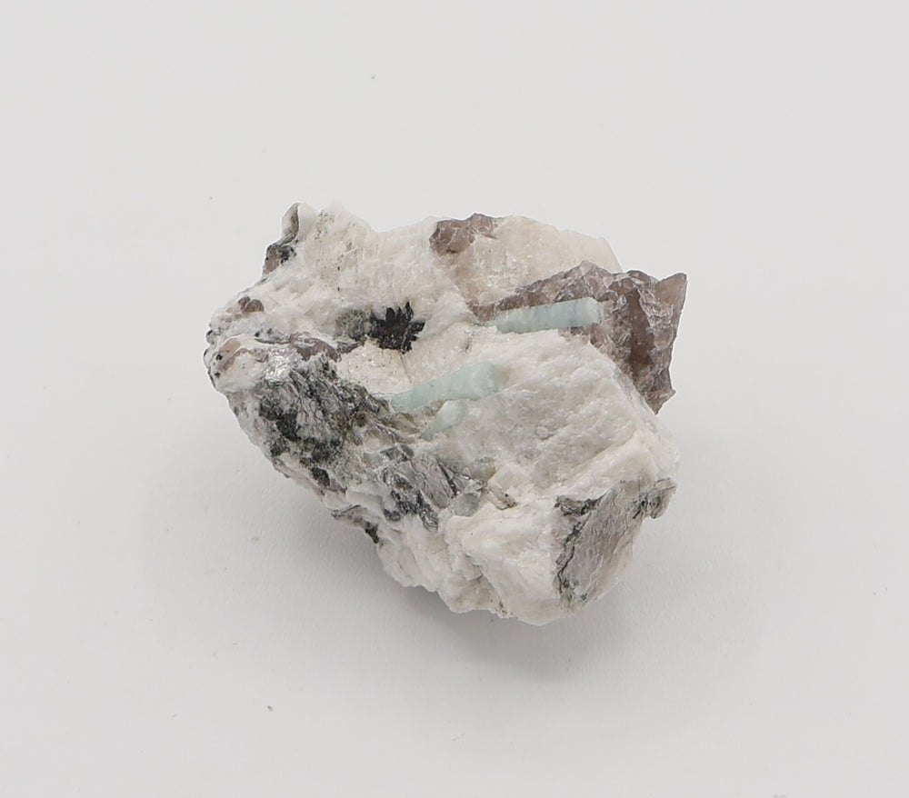 Aquamarine with Hematite, Mica, on Smoky Quartz and Feldspar