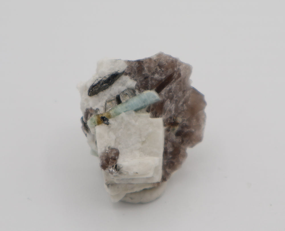 Bi-Colour Beryl with Hematite, Mica, on Smoky Quartz and Feldspar