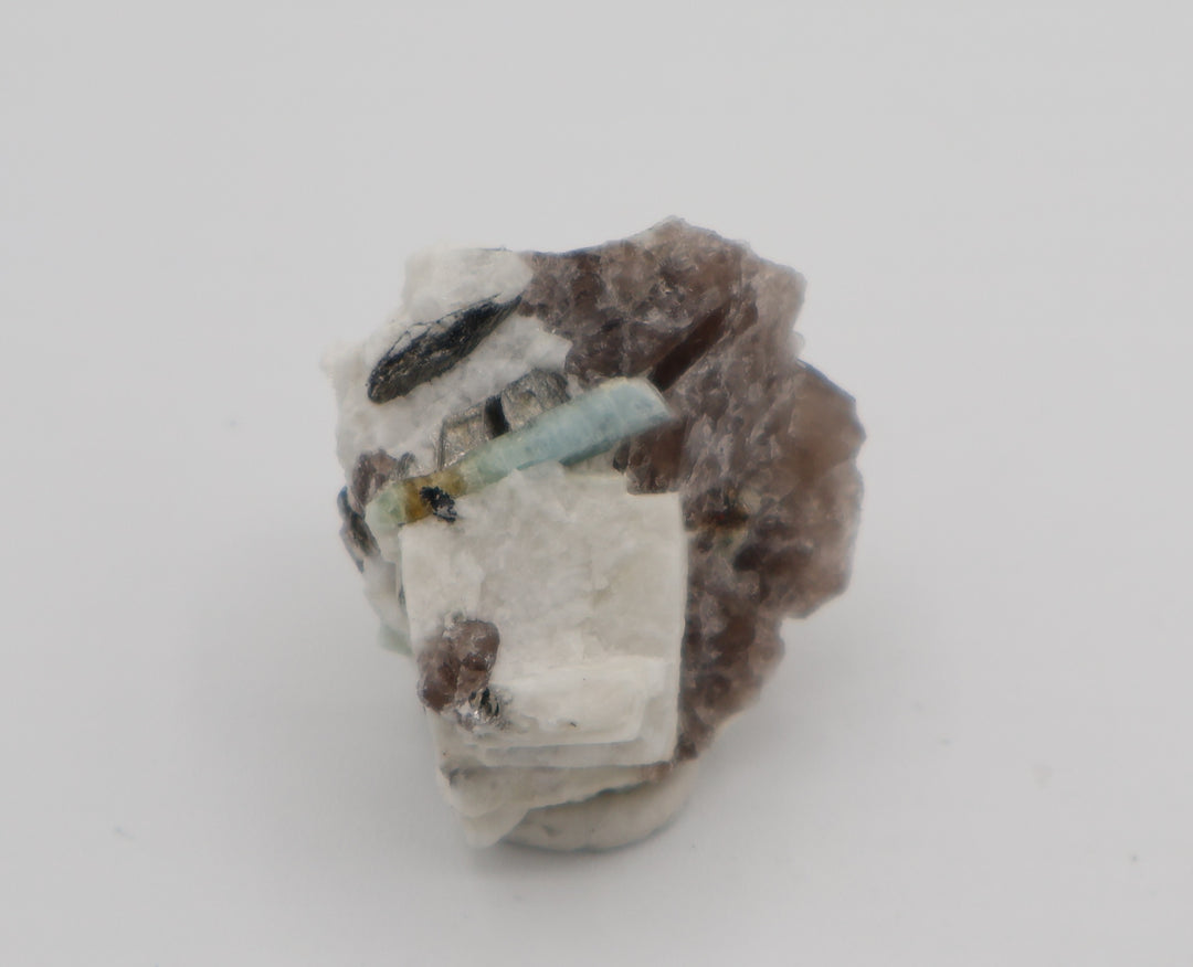 Bi-Colour Beryl with Hematite, Mica, on Smoky Quartz and Feldspar