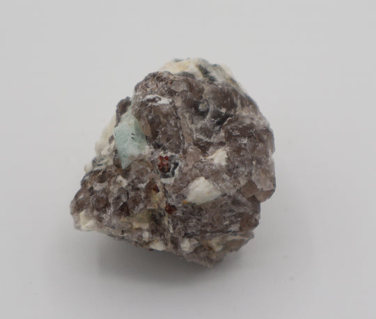 Aquamarine with Spessartine Garnet on Smoky Quartz and Feldspar