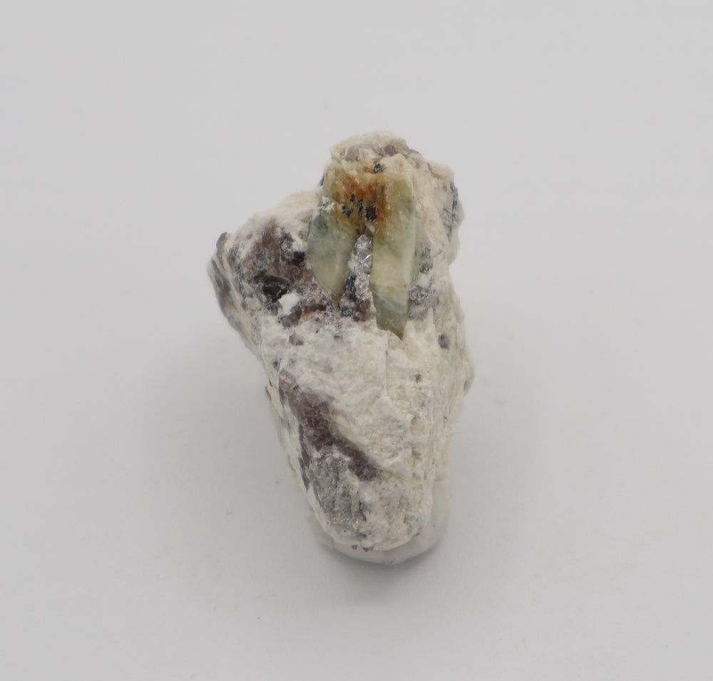 Bi-Colour Beryl with Hematite, Mica, on Smoky Quartz and Feldspar