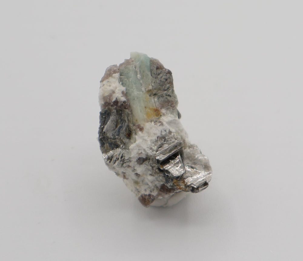 Aquamarine with Mica on Smoky Quartz and Feldspar
