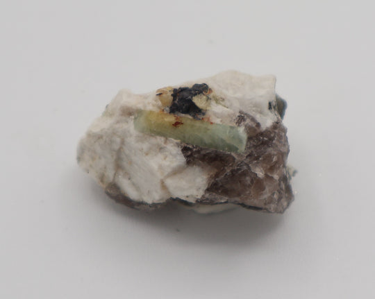 Bi-Colour Beryl with Hematite on Smoky Quartz and Feldspar