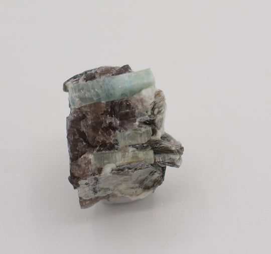Aquamarine with Mica on Smoky Quartz and Feldspar