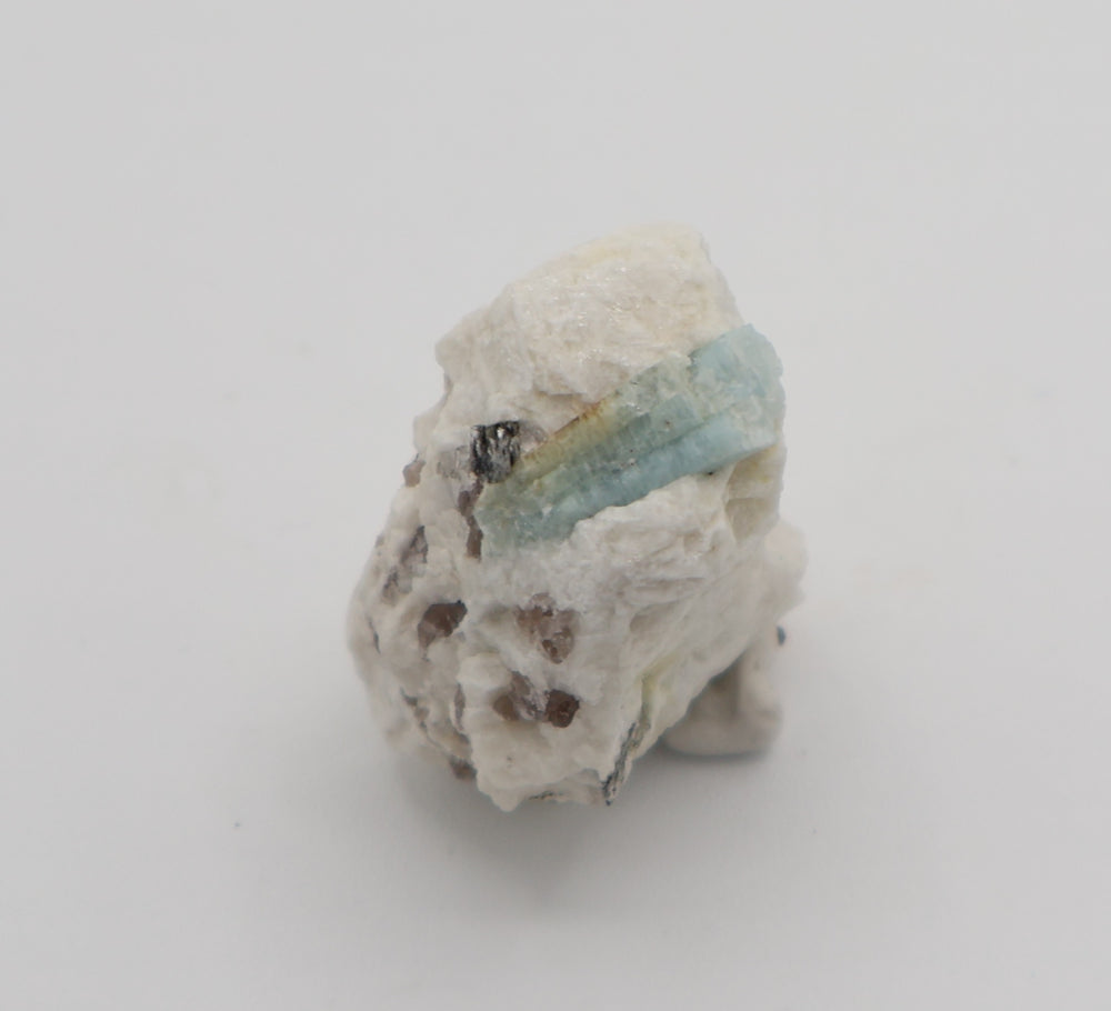 Aquamarine and Bi-Colour Beryl with Mica on Smoky Quartz and Feldspar