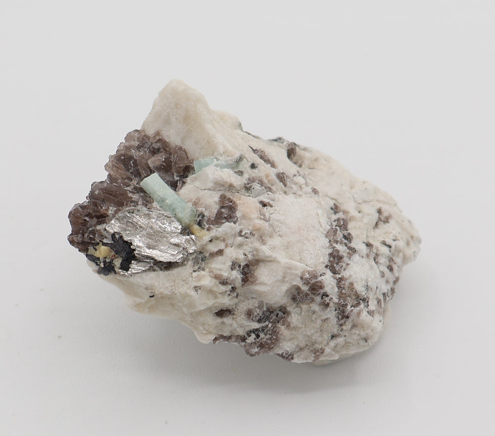 Aquamarine with Heliodor, Hematite, Mica, on Smoky Quartz and Feldspar