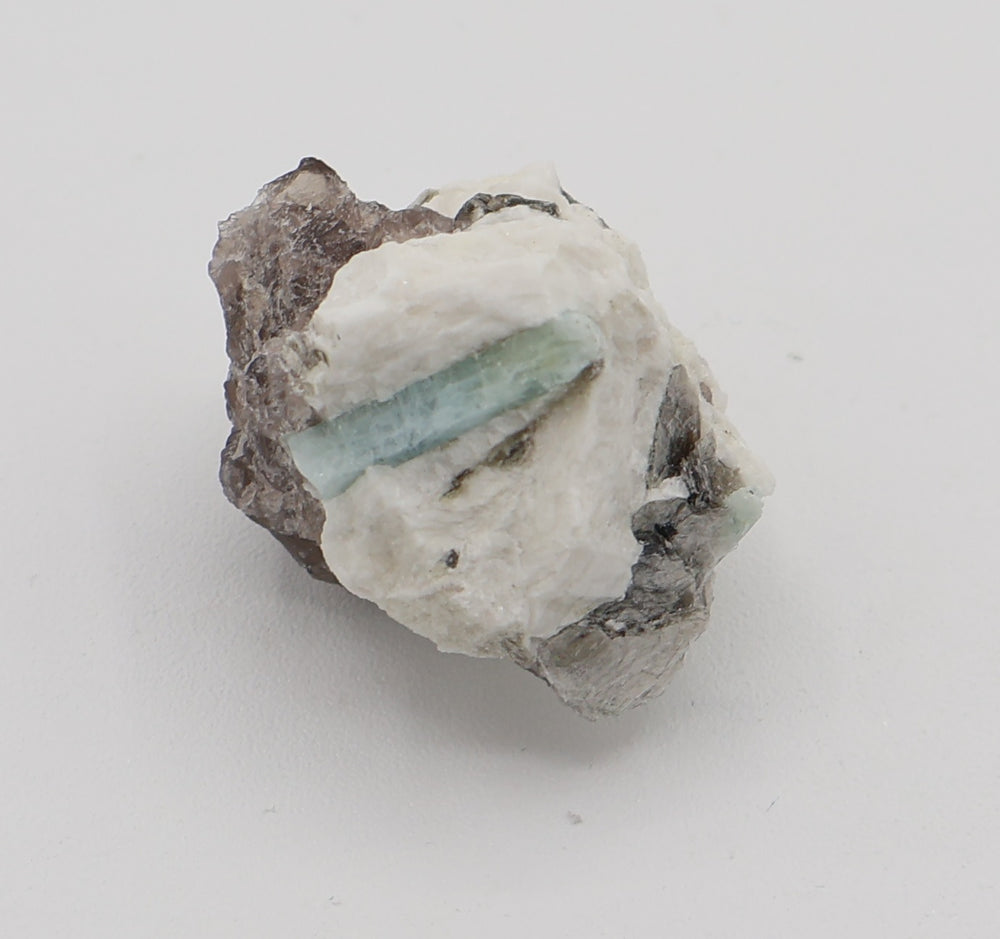 Aquamarine with Mica on Smoky Quartz and Feldspar