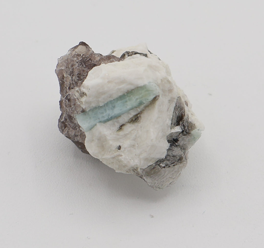 Aquamarine with Mica on Smoky Quartz and Feldspar