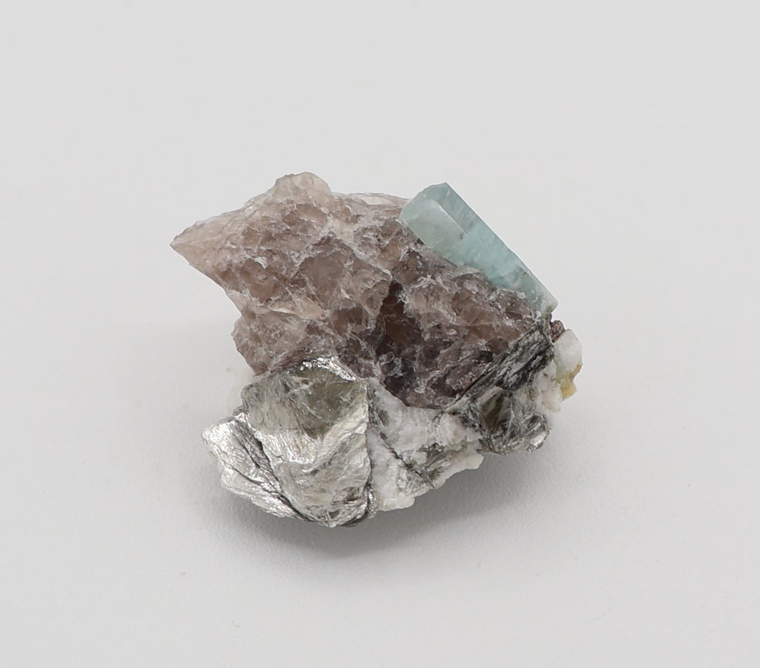 Aquamarine with Mica on Smoky Quartz and Feldspar