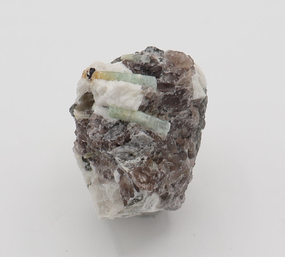 Heliodor Capped Aquamarine with Hematite, Mica, on Smoky Quartz and Feldspar