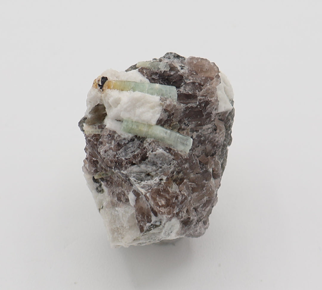 Heliodor Capped Aquamarine with Hematite, Mica, on Smoky Quartz and Feldspar