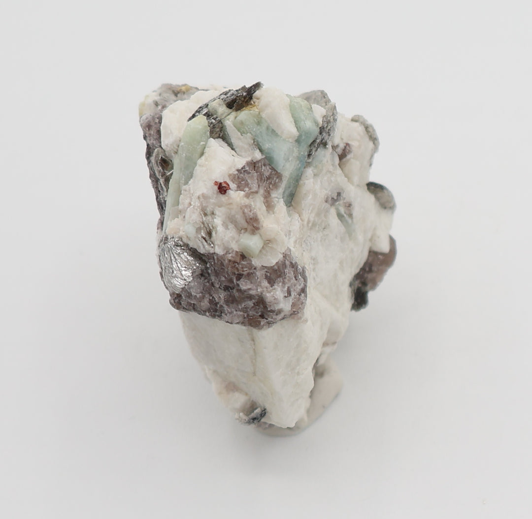 Aquamarine with Mica, Spessartine Garnet, on Smoky Quartz and Feldspar